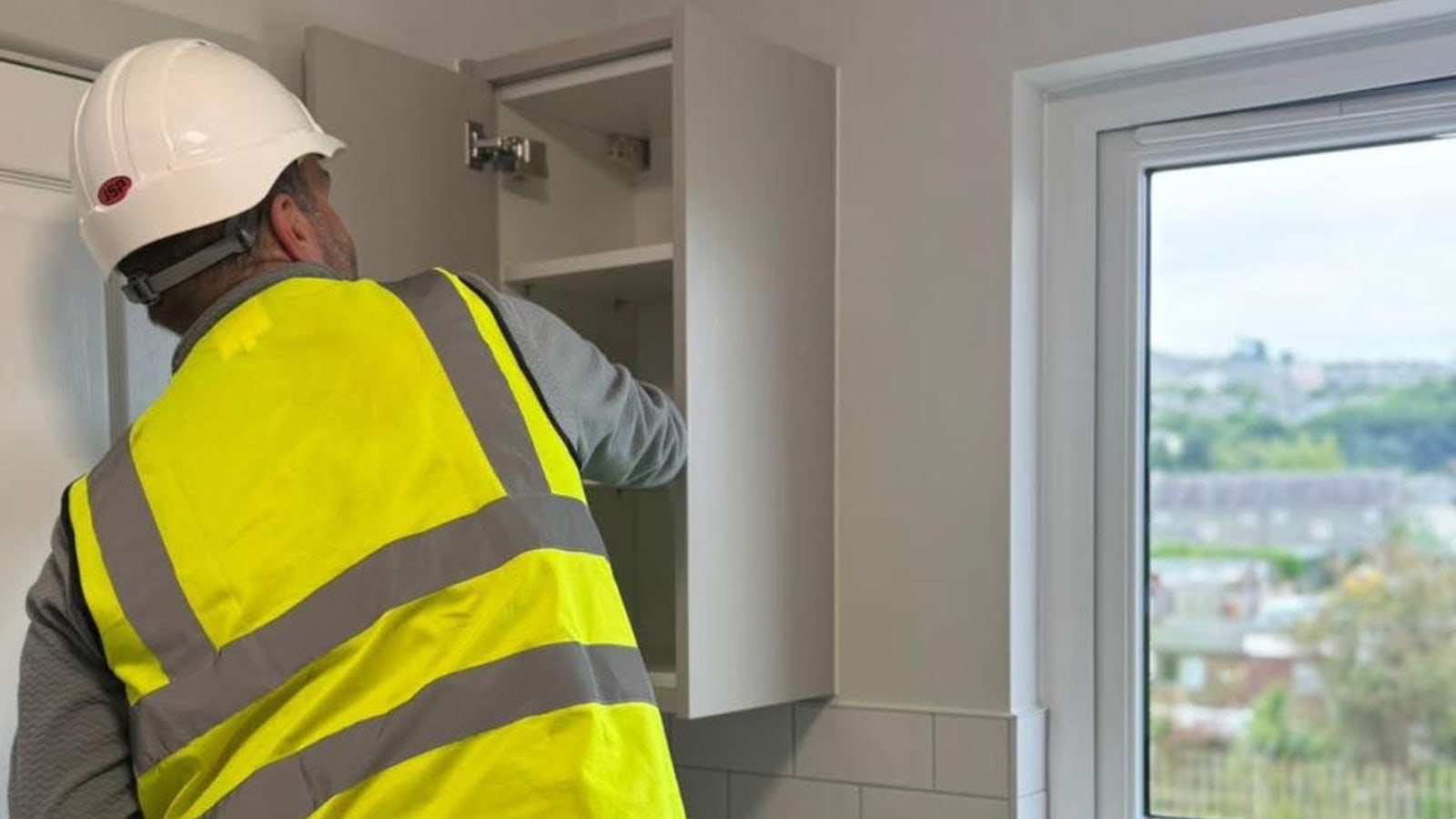 A new-build housing scheme in North Wales handed over after a builders clean