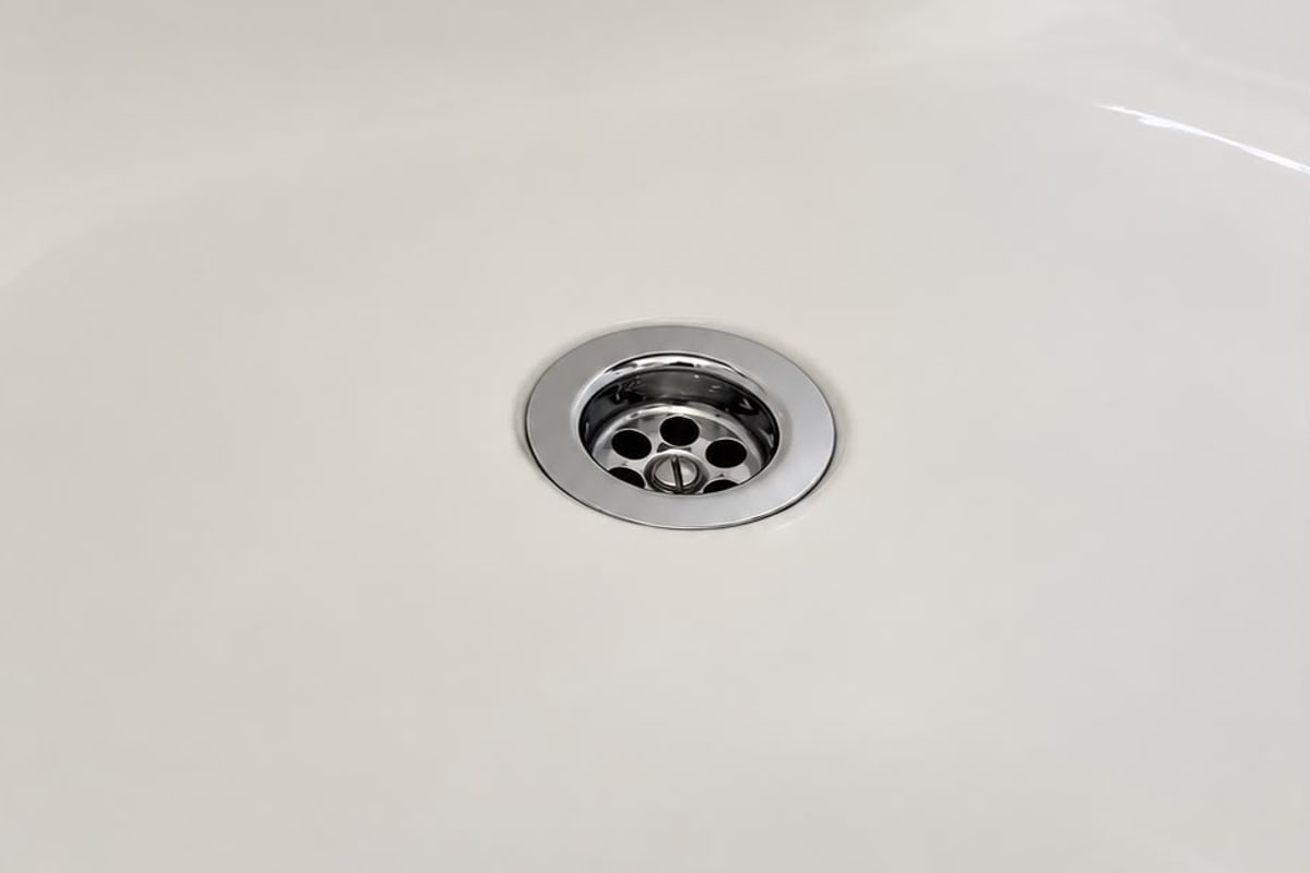 Bath drain cleared on a void in North Wales after the work