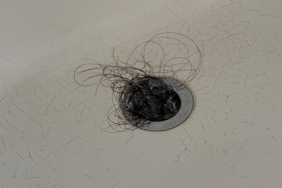 Bath drain cleared on a void in North Wales before the work